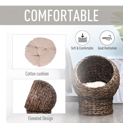 PawHut Handwoven Elevated Cat Bed with Rotating Basket and Soft Cushion, Wicker Cat Egg Chair with Stand, Brown
